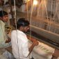 38 Varanasi - Exquisite silk weaving in tiny dark rooms.jpg